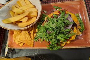 Bunless Burger with fries at Peter Pane - Holstentor in Luebeck