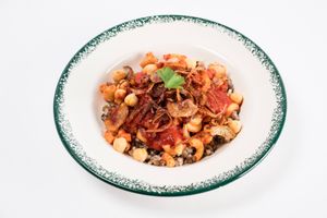 Travellers to Cairo often write about this ultimate street food craving to return for more. With layers of rice, lentils, pasta, a bold tomato sauce, caramelized onions and garnish at Papyrus in Toronto