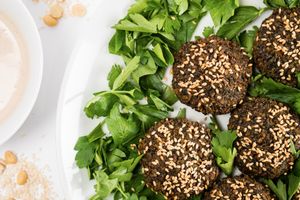 One of the classic and oldest of Egyptian food, Tameya is made from shelled fava beans ground with large amounts of fresh herbs and fried to perfection. Sesame seeds in the crust.  at Papyrus in Toronto