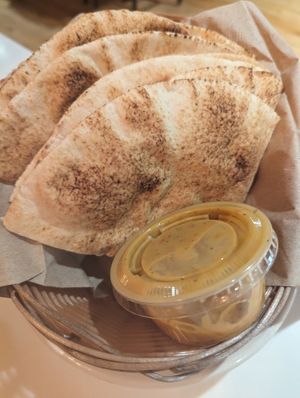 Pita and hot sauce at Aladdin's Eatery - Hyde Park in Cincinnati