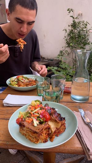 Lasagna and salad side  at Little Plant Pantry in Amsterdam