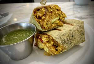 Delicious breakfast burrito 🌯   at Olive & Thyme in Toluca Lake