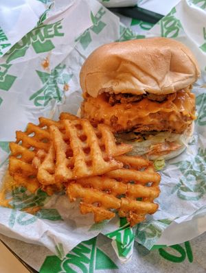 Flamin' Hot Clucker and Waffle Fries at Oowee Vegan - Baldwin in Bristol