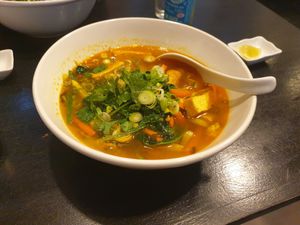 Turmeric based noodle soup with tofu at An Khang Quan in Dusseldorf