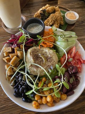 Buddha bowl, chicken fingers and coconut latte   at Ganita Cafe in Pai