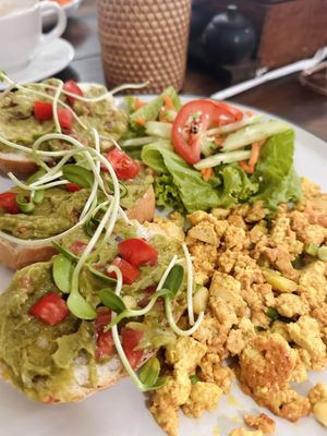 Avocado on toast (110 THB), side of tofu scramble (30 THB)  at Ganita Cafe in Pai