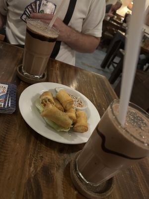 Spring rolls and snicker drink   at Ganita Cafe in Pai