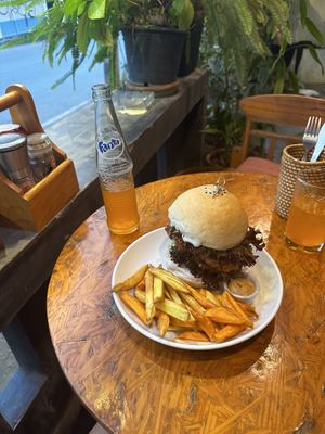 Happy chicken burger   at Ganita Cafe in Pai