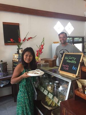 My wife enjoying some of the wonderful biscuits. at Ganita Cafe in Pai