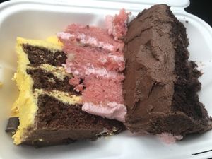 Chocolate banana, raspberry and chocolate orange cake to takeaway!  at Veggie Vixen Store and Coffee Shop in Littleborough