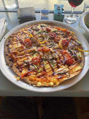 Verde pizza with vegan cheesee  at Laganon in Crete