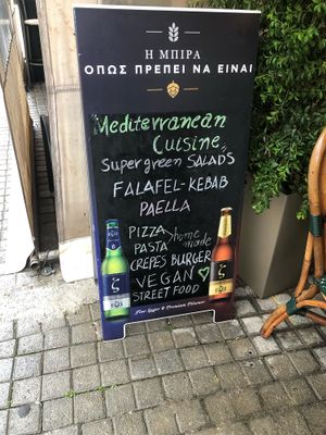 Advertises vegan on the street sign  at Avgo Tou Kokkora in Crete