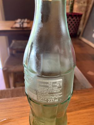 Tiny coke for 2.5€ unbelievable  at Gallo Santo in Barcelona