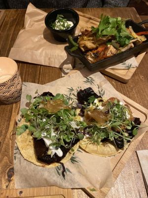 Plantain tacos and chicken fajitas in the back (a must try!) at Gallo Santo in Barcelona