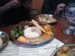 "NE-THALI SET - a big plate of rice, daal, Nepali curry of your choice, seasonal vegetable, saag, tomato achar(chutney) & a poppadum" at Tama in Auckland