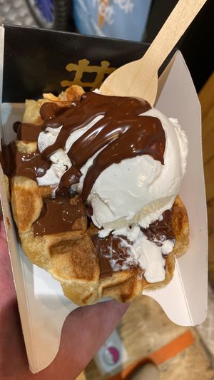 Waffle with chocolate sauce and vanilla ice cream   at VeganWaf in Brussels