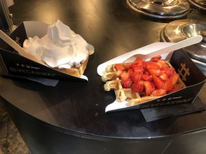 L: chocolate and Chantilly cream R: Liège sauce and strawberries  at VeganWaf in Brussels