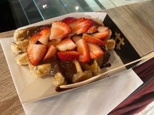 Waffel with chocolate topping (5,50€) and strawberries (2,50€) - 4.5/5. In total it cost 8€. at VeganWaf in Brussels