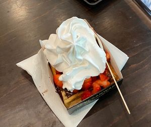 vegan waffle strawberries chocolate sauce and whipped cream   at VeganWaf in Brussels