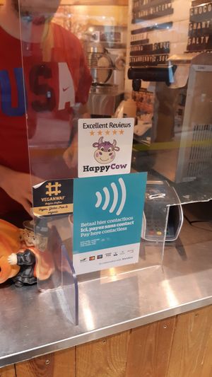 Delighted with their sticker at VeganWaf in Brussels