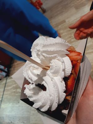 Waffle with strawberries, chocolate and whipped cream at VeganWaf in Brussels