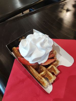 Waffle with caramel, strawberries and cream at VeganWaf in Brussels