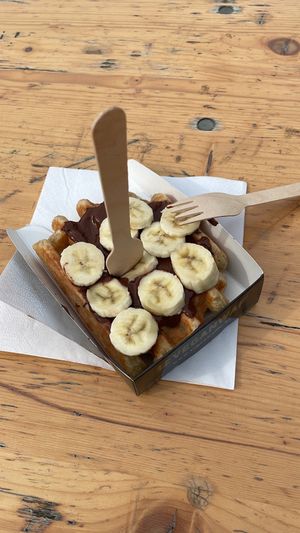 Waffle with chopped banana and chocolate sauce.  at VeganWaf in Brussels