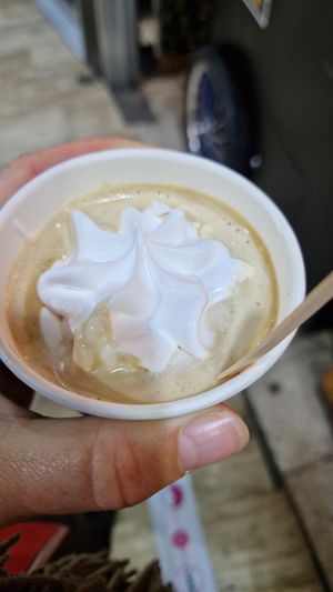 Cappuccino with whipped cream at VeganWaf in Brussels