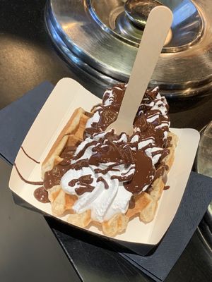 Vegan waffle with whipped cream and chocolate sauce    at VeganWaf in Brussels