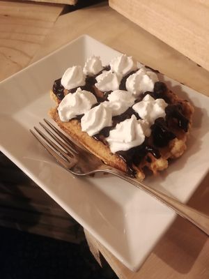 Waffles with chocolate and whipped cream at VeganWaf in Brussels