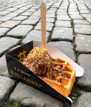Waffle with hazelnut ice cream, chocolate sauce and nuts at VeganWaf in Brussels