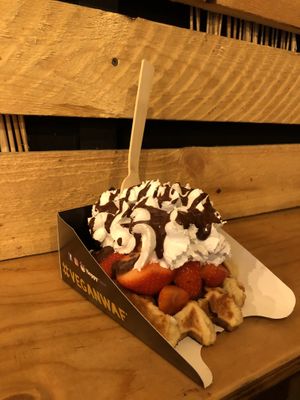 Vegan waffle with strawberries, cream and chocolate sauce. at VeganWaf in Brussels