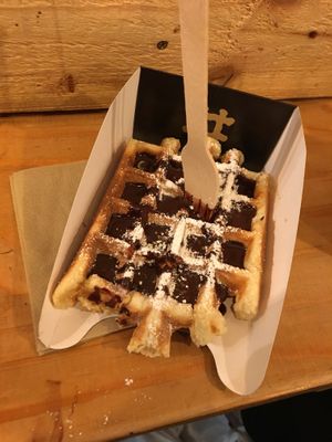 Waffle with chocolate sauce and sugar powder at VeganWaf in Brussels