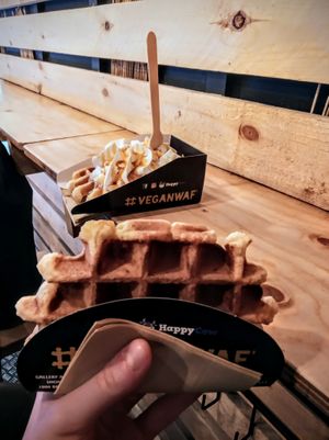 Plain waffle, and waffle with cream and caramel sauce at VeganWaf in Brussels