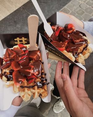 Vegan waffle topped with chocolate and strawberries. at VeganWaf in Brussels