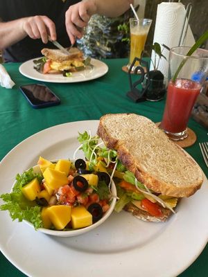 Hummus sourdough sandwich with mango salsa on the side + watermelon juice at The Garden in Koh Lanta