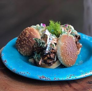 sukhastylebr
BBQ Jackfruit & Crimini Mushroom Sliders |
With cabbage apple & almond slaw, served on toasted sesame seed bun
Smoked in house. made from scratch at Sukha Cafe in Baton Rouge
