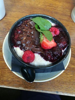 Wild Berry and Fruit Porridge with extra chocolate (6€) at Spreegold in Berlin