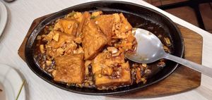 Sizzling tofu with housemade sauce at Loving Hut in Northbridge