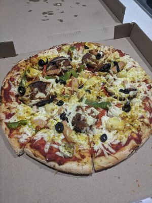 Supreme pizza at Loving Hut in Northbridge