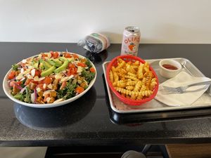 Spicy kale salad and house fries   at Can't Believe It's Vegan  in Westerville