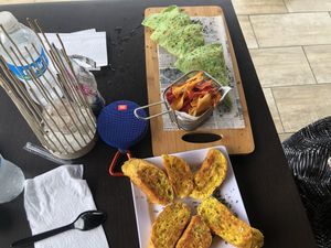 Spanish tortilla and yuca tortilla with garlic bread at Life Garden in Aguada