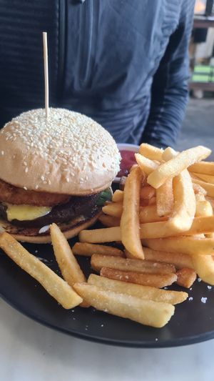 Beet Burger with beer battered onion rings at GG Bistro in Christchurch