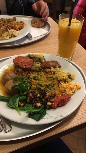 Vegan lunch with orange juice at Tibits in Lausanne