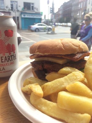 Cheese burger with bacon, fries and organic cola  at Pretend in Dublin