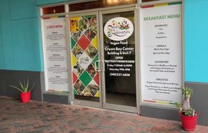 A photo of the outside of Speedy Redemption with their number. at Speedy Redemption in St Thomas