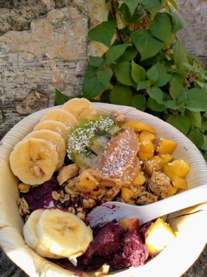 tried to walk home with my Acai bowl but had to eat along the way!! SO GOOD! at Aloha Vegan Delights - Maria Cristina in Valencia