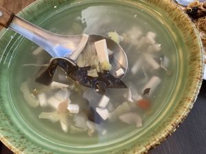Complimentary tofu, tomato, cabbage, and black woodear soup at Qǐ Ruò Yǎ in Taichung