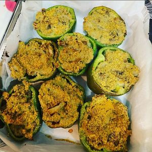 Stuffed peppers with homemade ricotta, mushroom, onion, spinach, cous cous, and more. at My Conscious Plate in Lake Worth