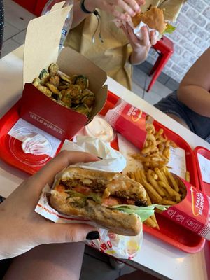 Cheese burger, signature fries and crispy jalapenos  at Halo Burger in South West London
